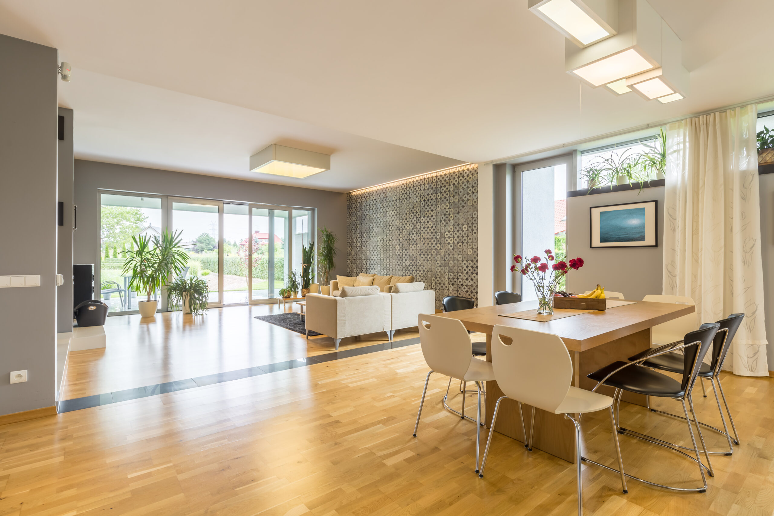 Big windows in spacious open plan house interior